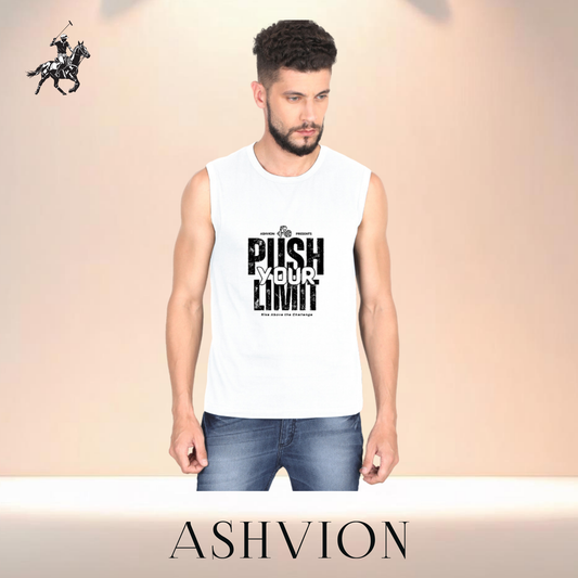 Man wearing a white sleeveless shirt with text and jeans, standing against a beige background with 'ASHVION' branding.