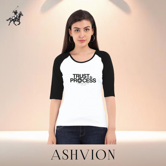 Woman wearing a black and white 'Trust the Process' t-shirt with an Ashvion logo.